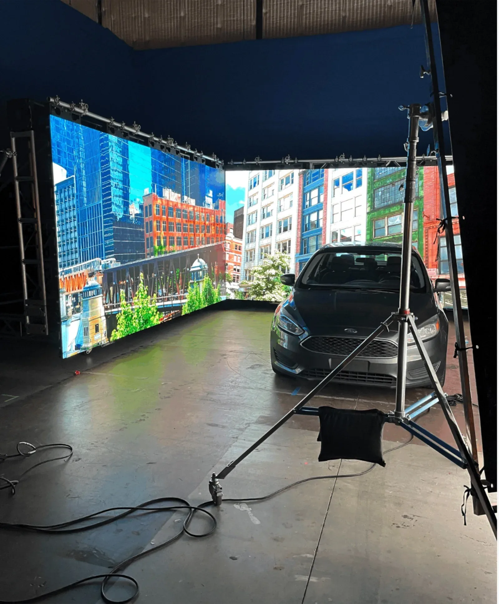 Swirl LED volume walls at ATL Film Studios with an in-camera driving plate and a car on the stage.